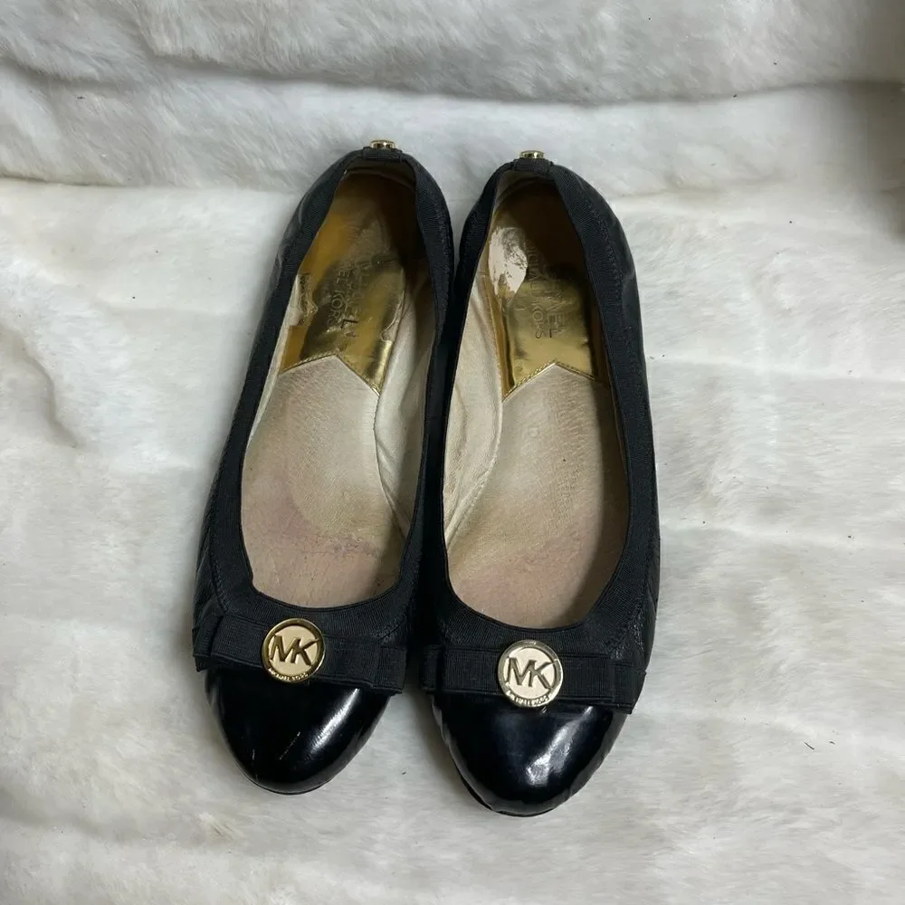 Michael Kors leather black slip on flats round toe gold tone logo accent SZ6.5